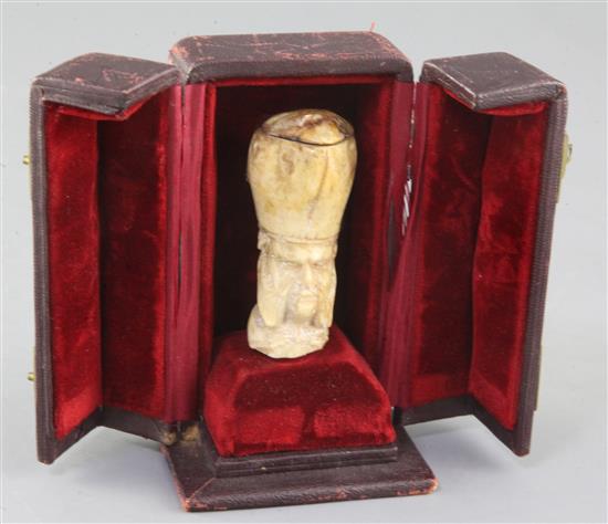 An early 19th century bone cane handle, 2.5in., in leather display case